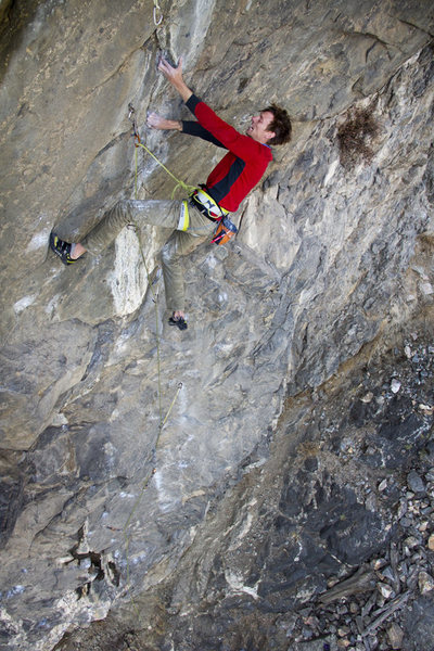 Matt on the crux.<br>
<br>
Photo: Keith North.
