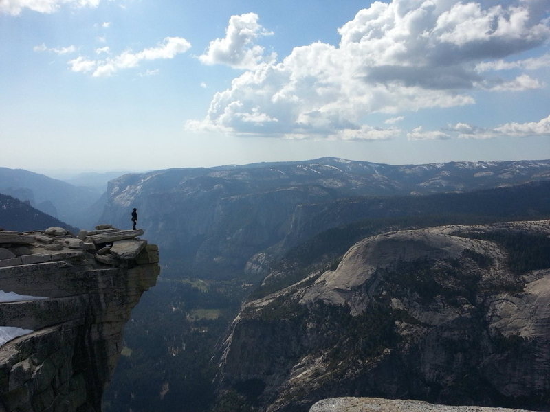 Adam standing on the "Diving Board" at the Half Dome summit after climbing Snake Dike, April 24, 2013