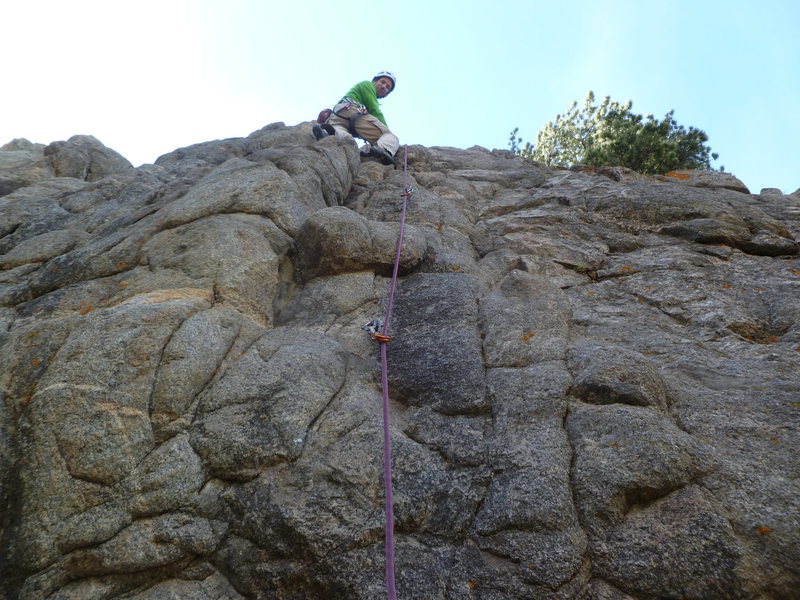 Near the top, the crux is at the first bolt.
