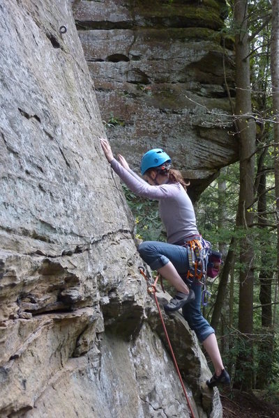 Just above the first bolt.