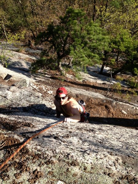 Joshua Corbett contemplates the crux moves on "The Big Finish" variation to The Wayback Machine.