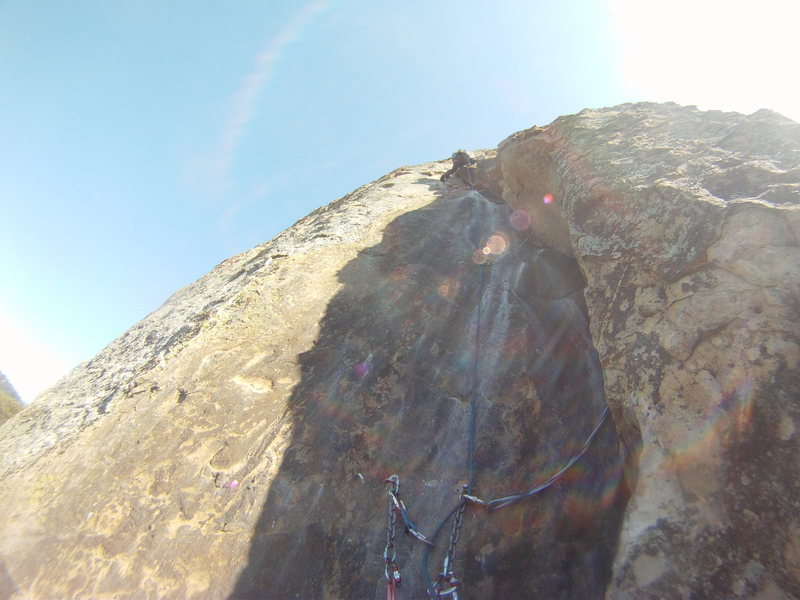 Nina Crushing the two cruxy roof maneuvers - use long runners on cams slid in under the roofs...