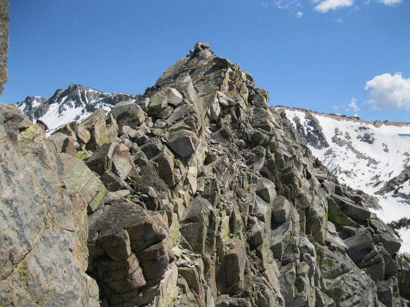 Top of North Arete route looking over to the true summit.