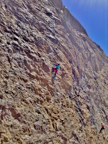 Warming up on Tsing Tao (5.10c) at the Great Wall of China, Central Gorge area.
