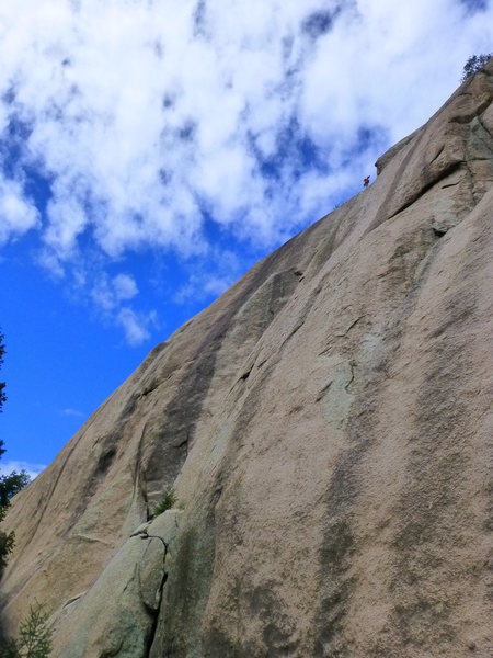 Ben at the top of Classic Dihedral on a really nice day.