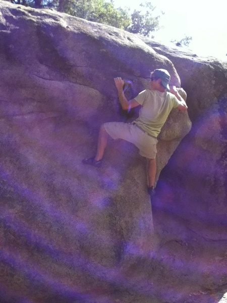 Josh starting out Tootsie Roll on the Canyon boulder