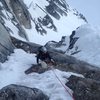 Adrienne Kentner climbing in early season mixed conditions on the 3rd pitch of the South Face. 