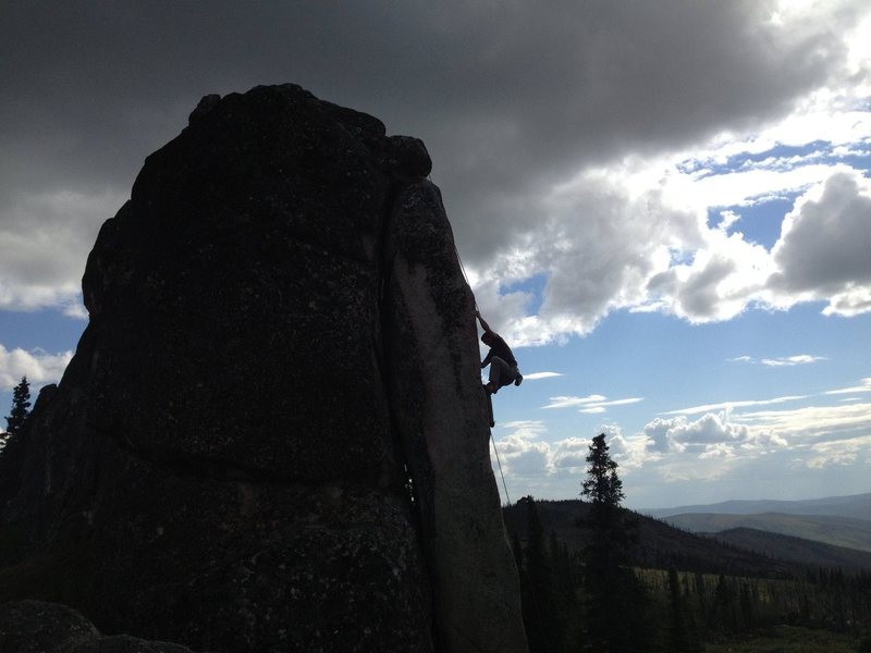 John Harley climbing The Fin 5.11