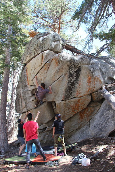 Setting up for a knee-bar, just before the crux move; right hand throw to a nice jug.