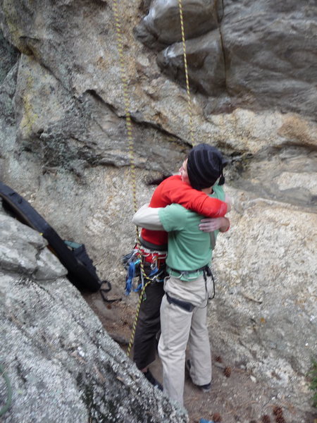 "keep your friends close and your belayers closer" my buddy giving me a hug after his first successful outdoor lead