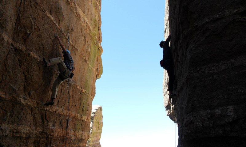 Chen Liang on Tsunami while John Hinrichsen works Dos Perras in the shadows.
