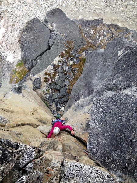 Adrienne Kentner following the steep 5.10- fist crack on pitch 5.