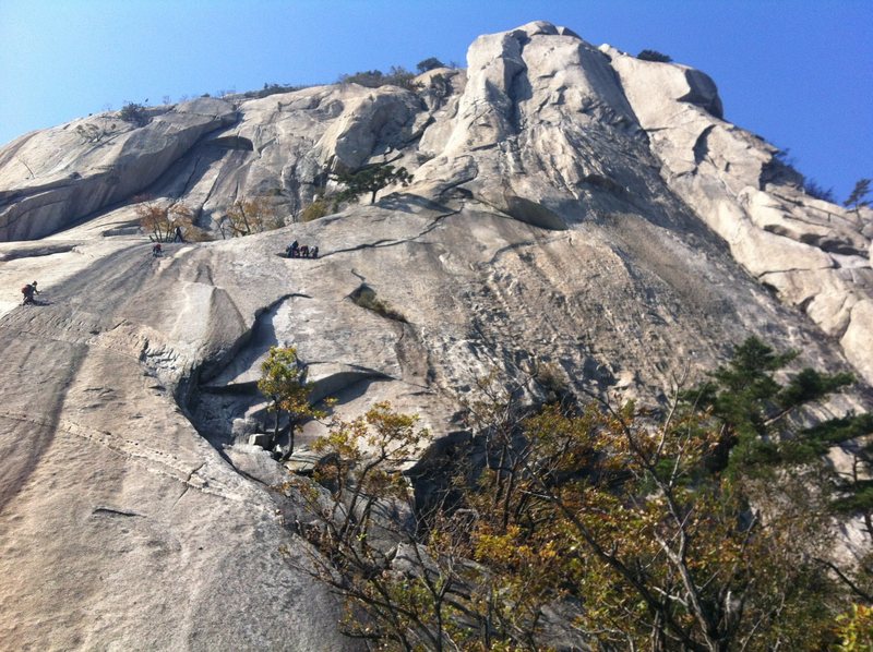 Four climbers about to start the second pitch