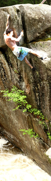 Topping out the main route after the crux. I fell from a move below this and hit all water but scope your landings always. Climb safe!