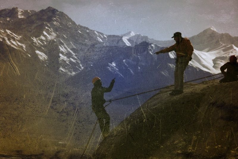 A student rappeling off the top of Taley.