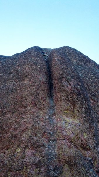 Setting up an anchor at the optional belay.