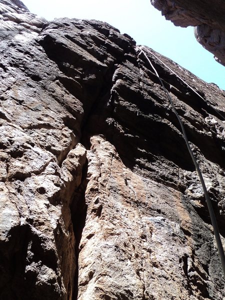 Funnel Web. Not to be confused with Sink the Pink (5.12a), the RP sized crack right of this line.