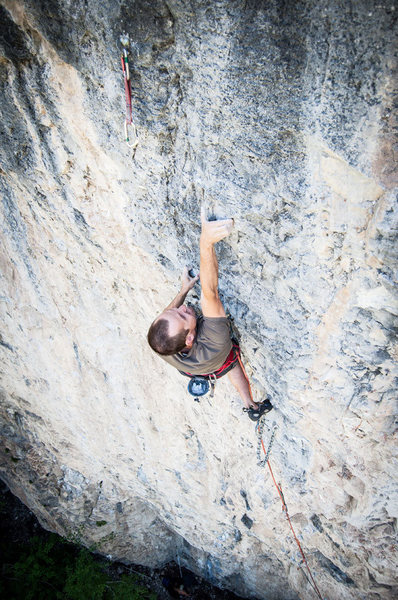 Pawel reaching from a bad left hand pinch to a worse right hand pinch. He is above the anchors of vice grip.