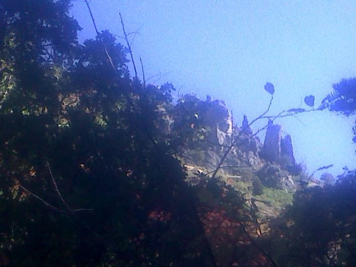 photo of Castledong Tower from the trail. It is the one on the right. Route goes up the shady face.