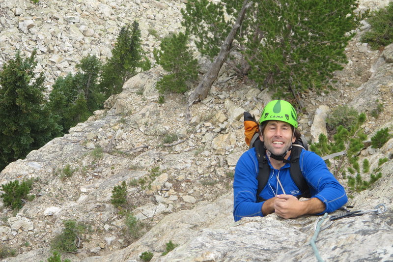 Erik Weihenmayer is psyched to have found the jug at the headwall roof! <br>
<br>
(photo: Charley Mace)