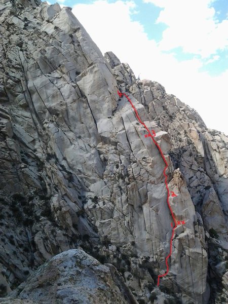 Poomerang climbs steep rock on the backside of Elderberry Buttress.
