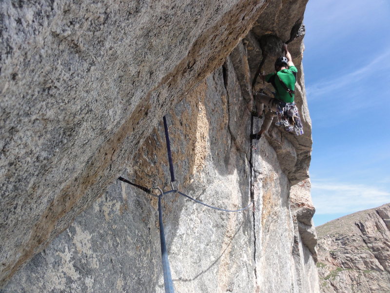 Nate Weitzel in the 11 hand crack through the roof.<br>
<br>
Photo by Quinn Stevens.