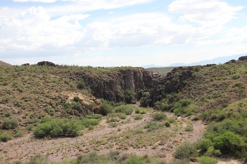 This obvious-looking canyon is actually NOT your destination. When you see this, trend left up the wash until you reach the slot canyon with bolts.