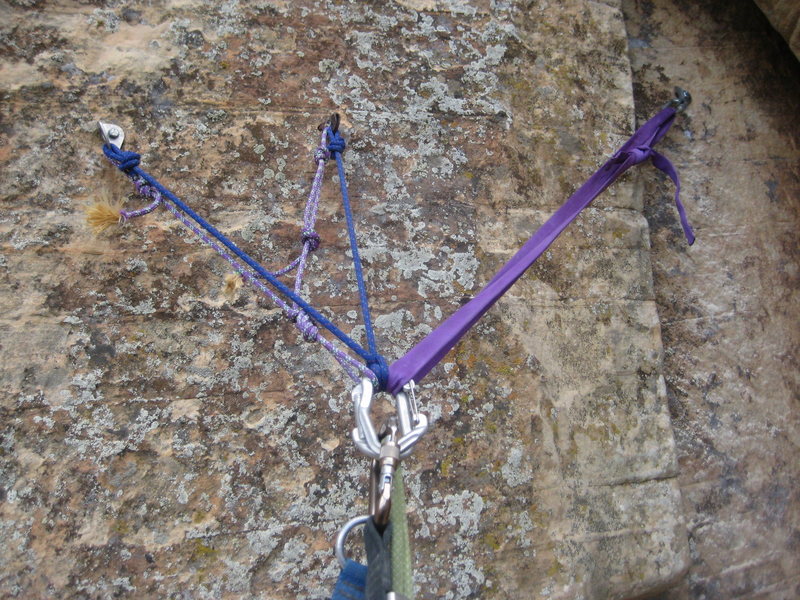 P2 anchors. 1/2" bolt added 8/10/13 in solid rock above the stance, and right of the 4" hollow plate the other bolt and pin are in.