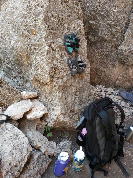 Shoes sticking to the slanted boulder at the base of Black Slabbath