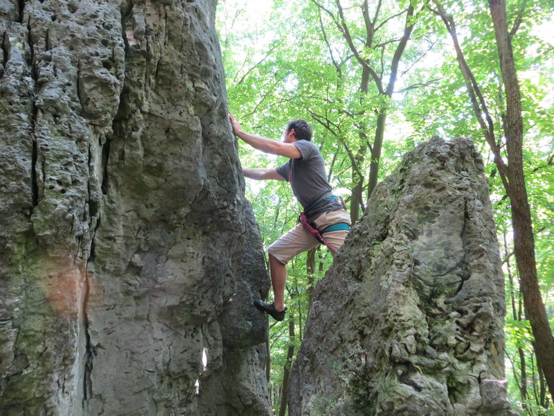 Me transitioning from the block onto the wall.