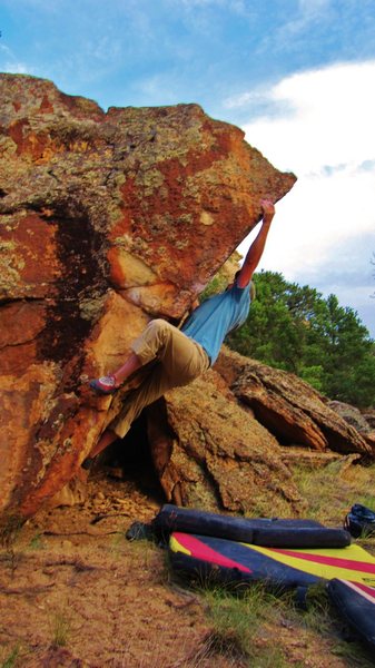 Brad sticking the crucial arete hold.