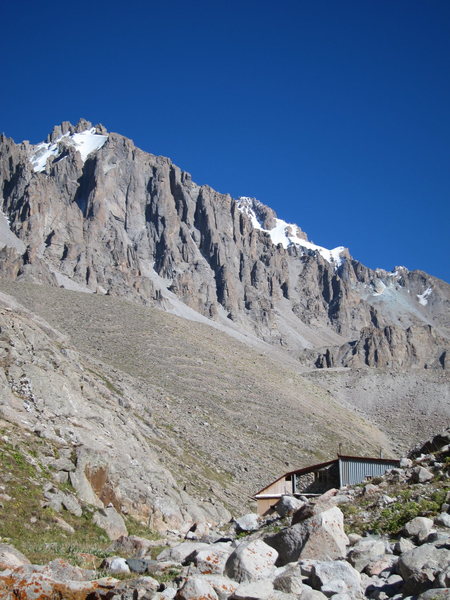 Ratsek cabin is in the foreground and Schwaba goes up the stacked columns on the rock will directly above.