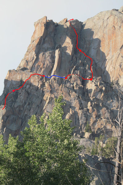 The upper portion of Left Handed Compliment.  Move the belay across the ledge in the vicinity of the blue line and the dots indicate route is out of sight.