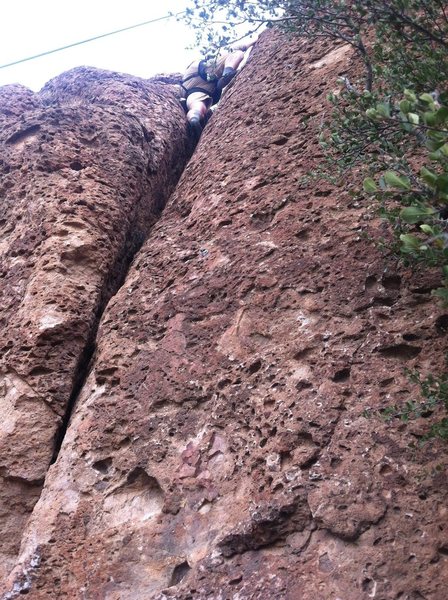 Fun Crack on left side goes from finger to off width. Great for new climbers.