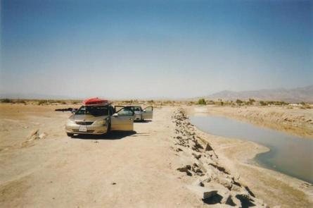 Our mighty sedans (LOL) at the launch site... note how far the water has receded from the "boat ramp."