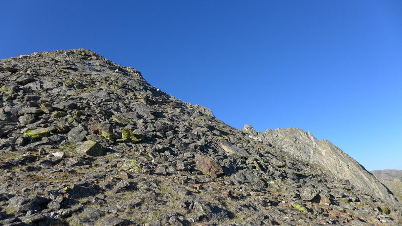 Talus heap false summit.