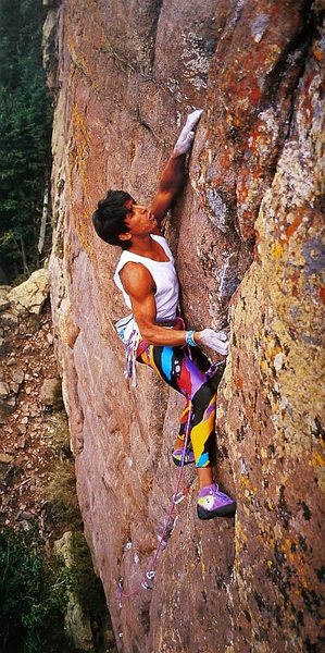 John Duran at the crux of Cat Daddy (5.13a), Sandia Mountains<br>
<br>
Photo by David Benyak