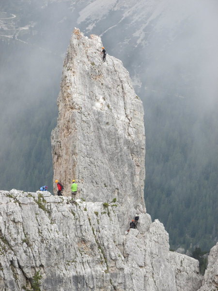 Climbers on Torre Inglese, seen from Torre Lusy; nearer, another group atop Torre Quarta Alta.