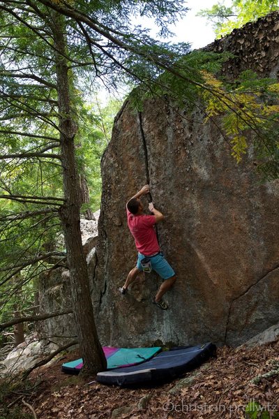 Locking it up on 'Granny's Grunt' (v3)- Cliff Boulders, Pawtuckaway. Photo by Erika Curry-Elrod
