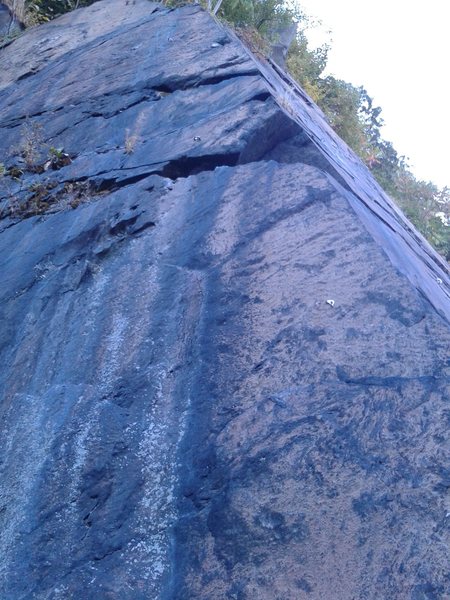 Body Drama. The 12 start is on the arete to the right and the 11 goes straight up and merges with the 12 about 12ft up.