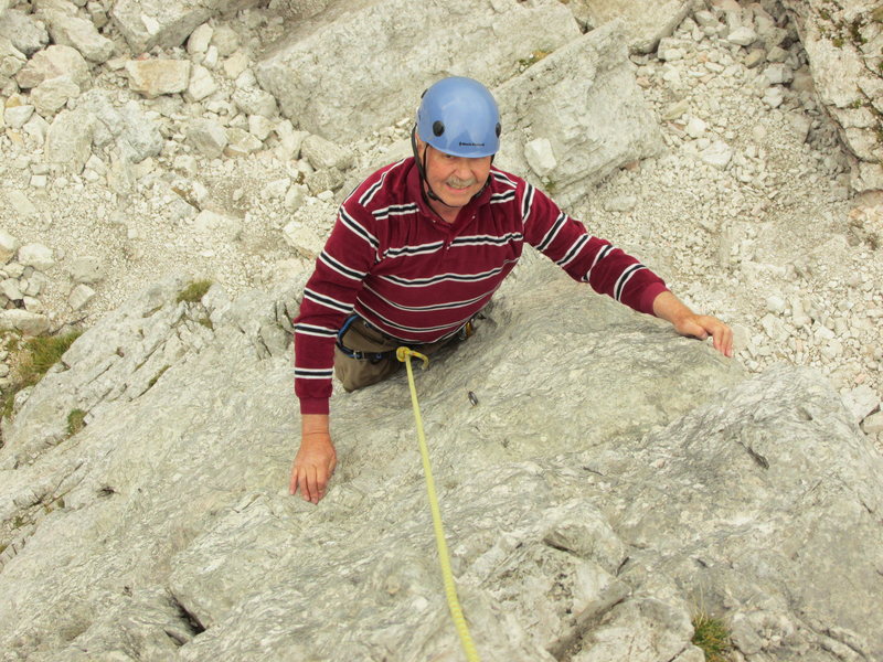 Me, on the first pitch of Torre Lusy. This ascent was made on the 50th Anniversary of my earlier climb of the route on 8 September 1963. This was my first introduction to climbing in the Cortina area at Cinque Torri.