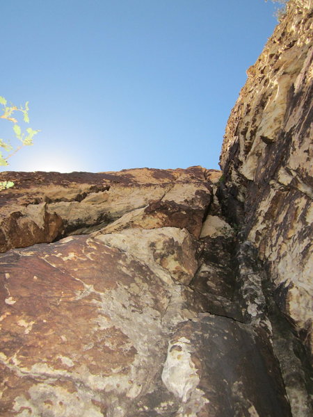 If doing the route in three long pitches, this is looking up at pitch 2. This is from the large ledge with the bomber belay tree.