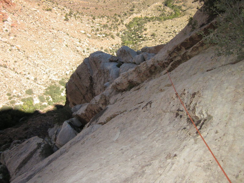 Looking down at the top half of the final pitch and the traverse needed to get to the top of the climb.
