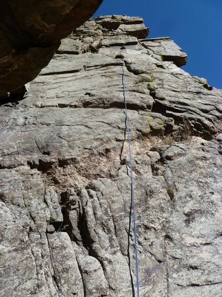 It looks like most people ascend the crack to the right of the rope. Darren Mabe shows the climb further to the right.