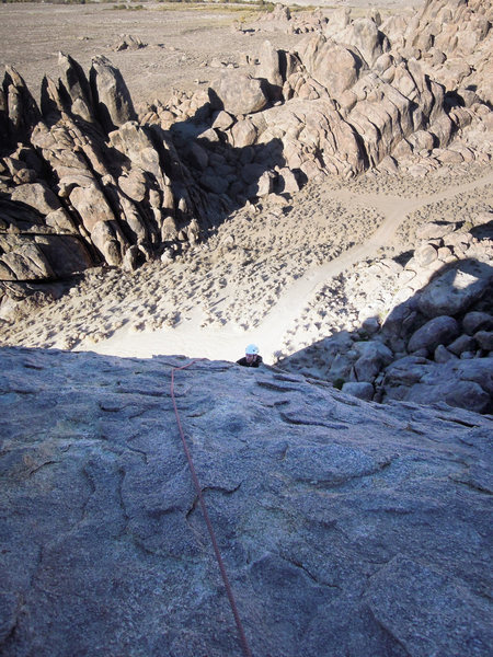 Chris Wing just getting to the easier angle section on top. (Yes, it really is that high up. A nice, long, fun route.)
