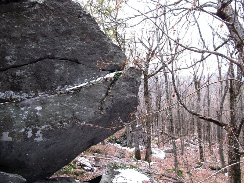 To start "Edges to Ledges" sit start to the right and very close to the near, small block at the lower left of the photo. Make a big move to the obvious break ledge, and top out however.