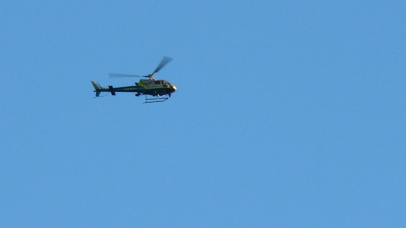 A helicopter making a flyby over the Egg, at Texas Canyon. Helicopter traffic has gotten to be quite frequent.