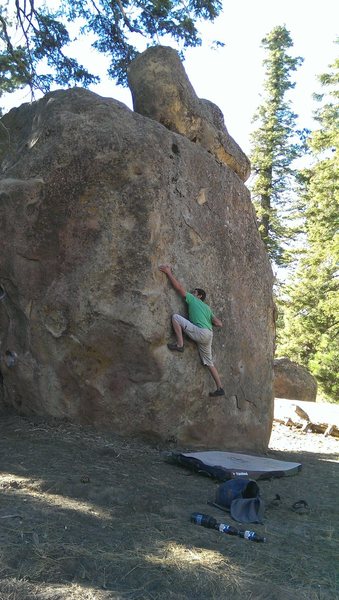 Sean reaching for the arete.