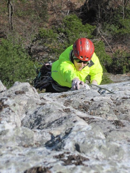 Gail pulling one of the crux moves on P2 of Westward Ha. Photo by Seth