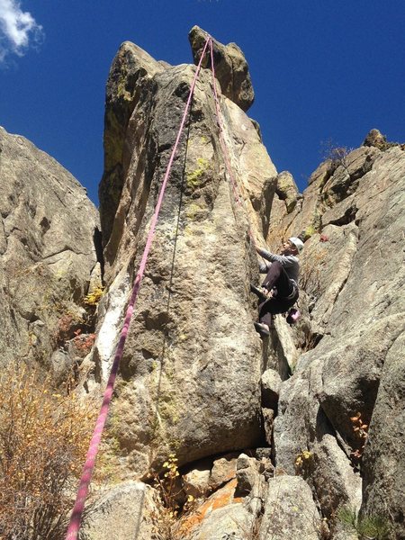 Mike follows Ear Rings. Easy Crack lies right of Mike in this perspective, then it jogs left and up. Edgy climbs the short slab above and behind Mike's helmet.